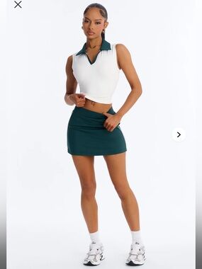 White Sleeveless Polo Crop Top with Dark Green Tennis Skort set